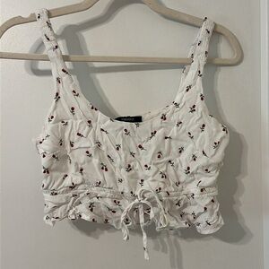 Rose printed white crop top! With a pull string tie!